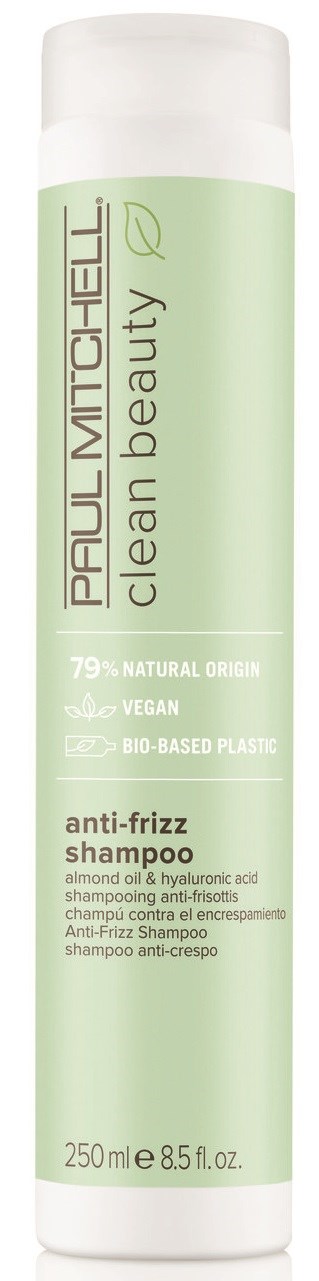 En høy, grønn og hvit flaske av Paul Mitchell anti-frizz sjampo med etikett.