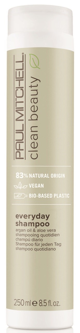 Pitkä, valkoinen putkilo Paul Mitchell Clean Beauty shampoolla, vihreä ja beige etiketti.