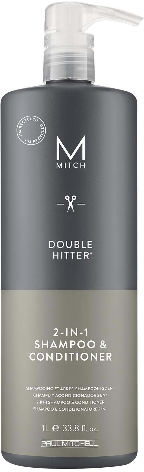 En sølv- og svart flaske med pumpe, merket 'MITCH DOUBLE HITTER 2-IN-1 SHAMPOO & CONDITIONER' i hvit tekst.