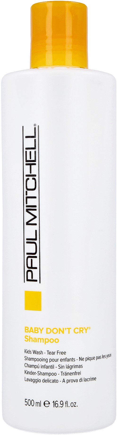 Valkoinen shampoopullo keltaisella korkilla ja etikettillä. Brändi on Paul Mitchell, ja se on vauvoille.