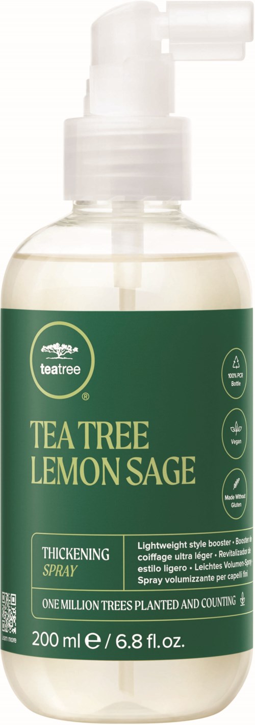 A clear spray bottle with a green label stating it contains tea tree, lemon, and sage for skin. It is a thickening spray.