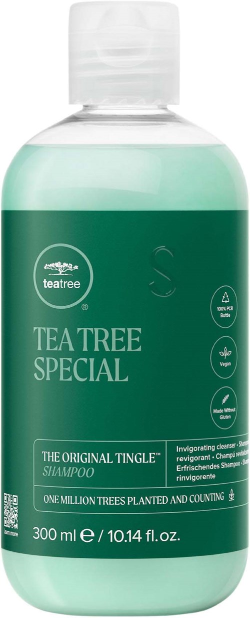 A green shampoo bottle labeled 'Teatree Special' with a white cap, containing 300 ml of shampoo for hair cleansing.