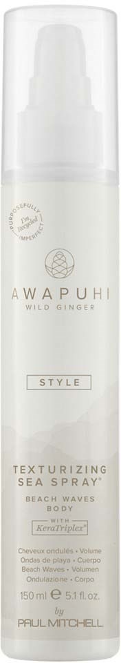 Biała butelka spray z napisem Awapuhi Wild Ginger Style Texturizing Sea Spray na plażowe fale.