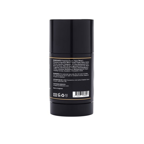 A black bottle with a label showing ingredients and warnings, likely a cosmetic or skincare product.