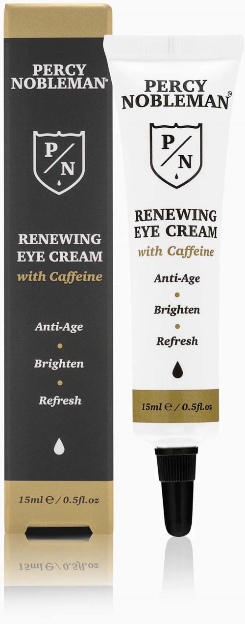 Eine Schachtel und eine Tube von Percys erneuernder Augencreme mit Koffein, die Anti-Aging, Aufhellung und Belebung betonen.