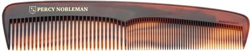 A black hairbrush with orange bristles and the brand name Percy Nobleman printed on it.