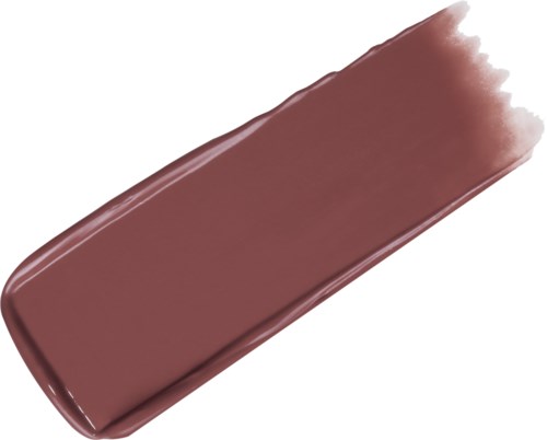A brown lipstick smear on a black background with some uneven edges.