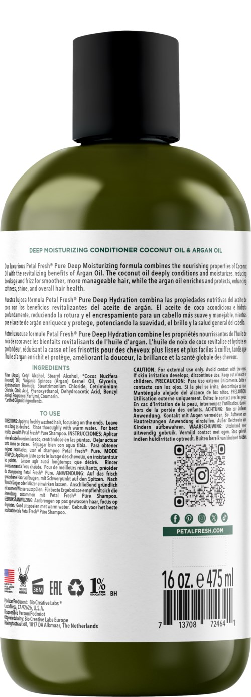 The bottle is green with a black cap, containing deep moisturizing conditioner with coconut oil and argan oil. The label has text and symbols.