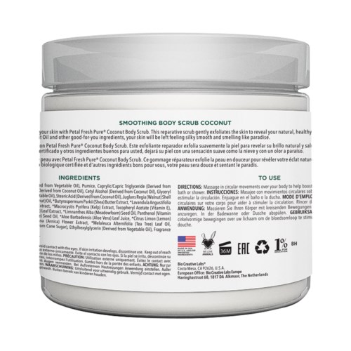 Container of coconut-scented body scrub with ingredients and usage instructions written on it.