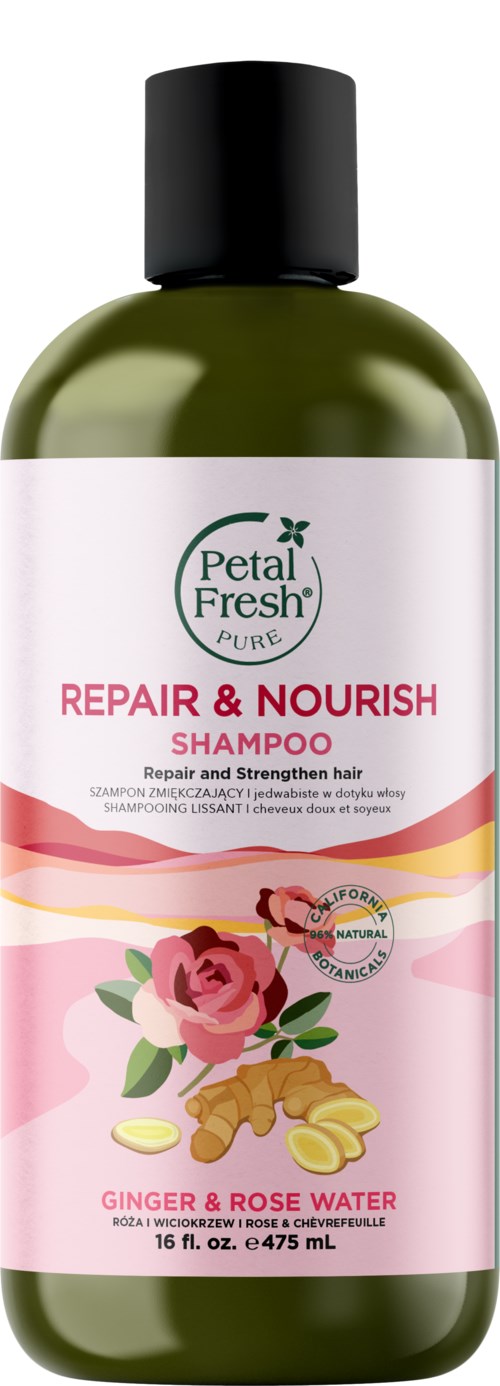 A green bottle of Petal Fresh shampoo labeled for repairing and nourishing hair with ginger and rose water.