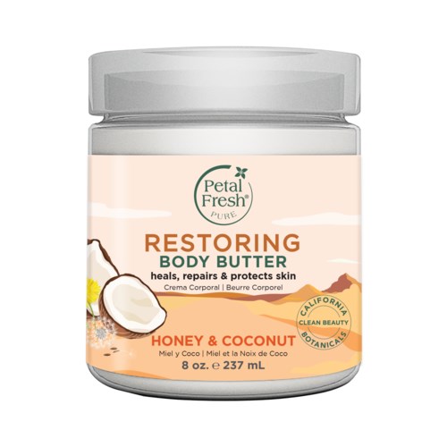 A jar of body butter with honey and coconut, labeled as healing, repairing, and skin-protecting, by Petal Fresh.