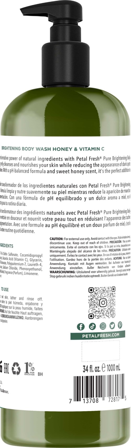 Green bottle with a black pump, contains a body wash product. Label has text and a QR code.