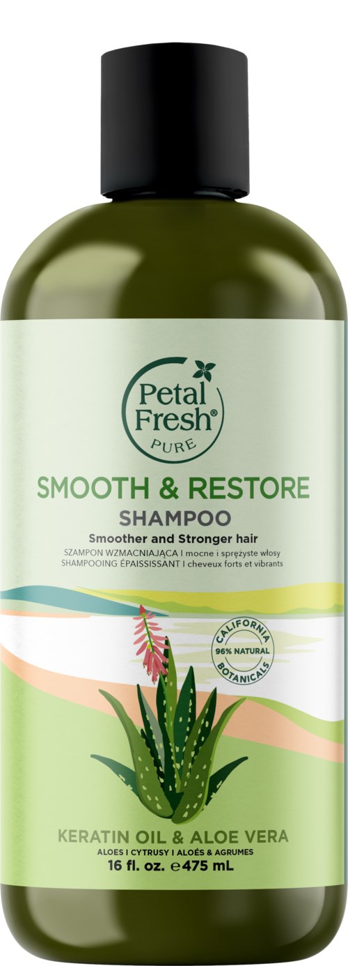 A green bottle of Petal Fresh shampoo, labeled 'Smooth & Restore' with ingredients like keratin oil and aloe vera.