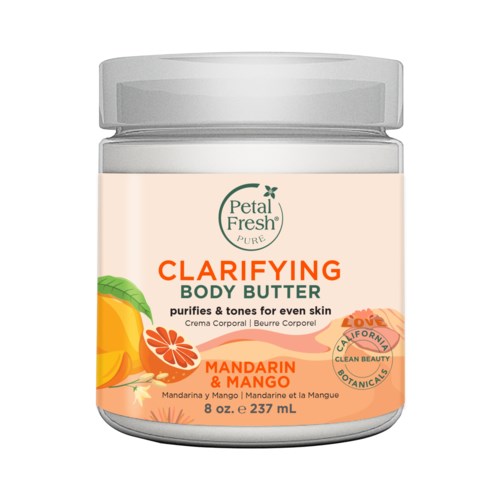 A jar of body butter with a label showing mandarin and mango scents. The label mentions skin benefits and brand Petal Fresh.