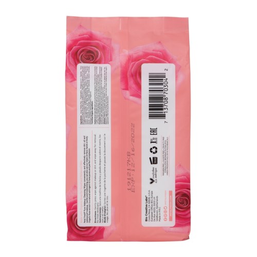 Een roze verpakking met rozenafbeeldingen en barcode, met tekst en symbolen, waarschijnlijk een cosmetica- of schoonheidsproduct.