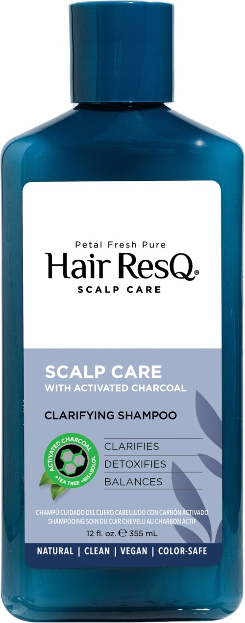 Blue shampoo bottle labeled for scalp care with charcoal, clarifies, detoxifies, and balances hair and scalp.