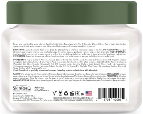A jar of SkinResq cream with a green lid, product description, ingredients, and usage instructions written on the label.