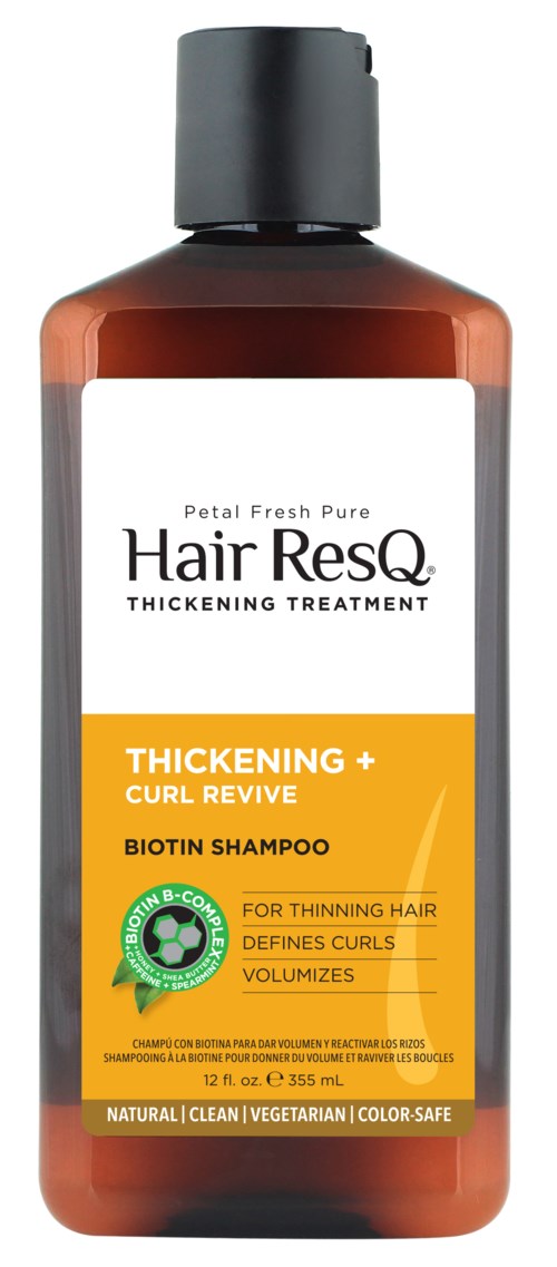 A brown bottle of Hair ResQ shampoo with a white and yellow label, black cap, and text highlighting thickening and curling.