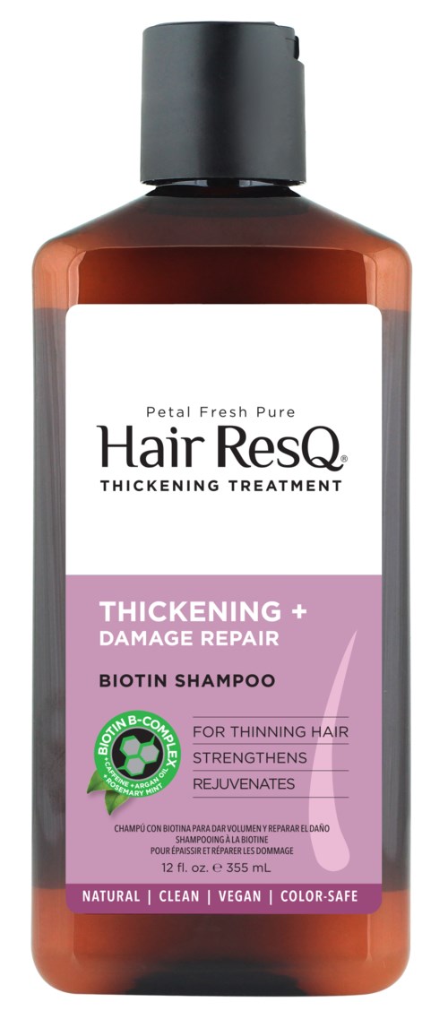 A brown shampoo bottle with a white and purple label, indicating it is for hair thickening and repair.