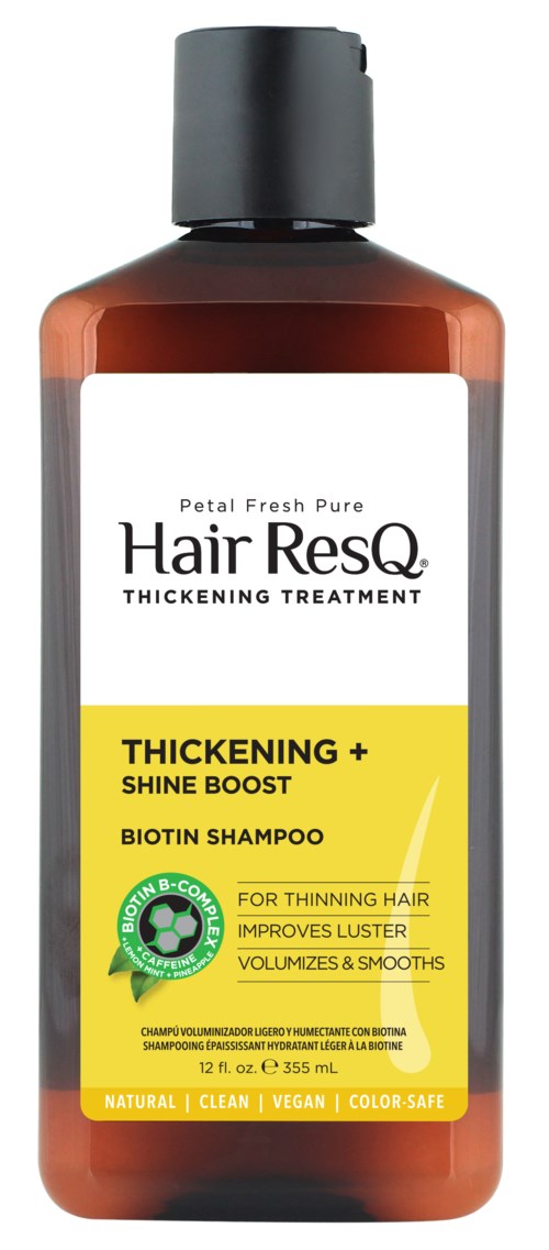 A bottle of Petal Fresh Pure Hair ResQ Thickening Treatment shampoo with a black cap and yellow and white label.