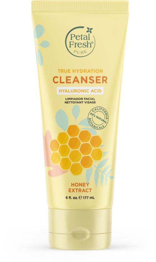 A tube of facial cleanser with honey extract, hyaluronic acid, and natural ingredients. Bright yellow and green colors. Petal Fresh label.