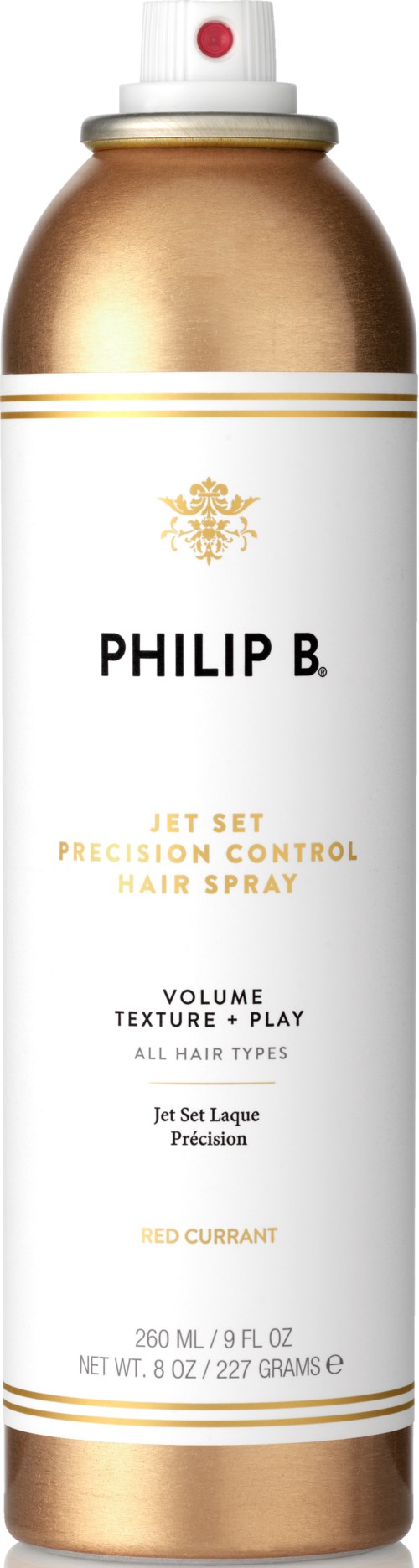 Ett guld- och vitt aerosolburk märkt Philip B. Jet Set Hårspray, med information om volym, textur och doft av röd vinbär.