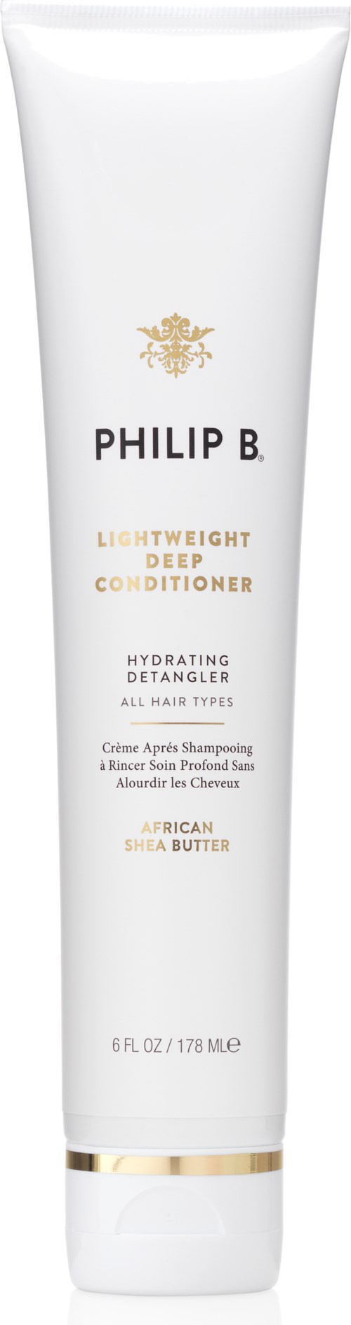Eine weiße Tube mit Philip B leichtem Tiefen-Conditioner mit goldfarbenen Akzenten und schwarzem Text.