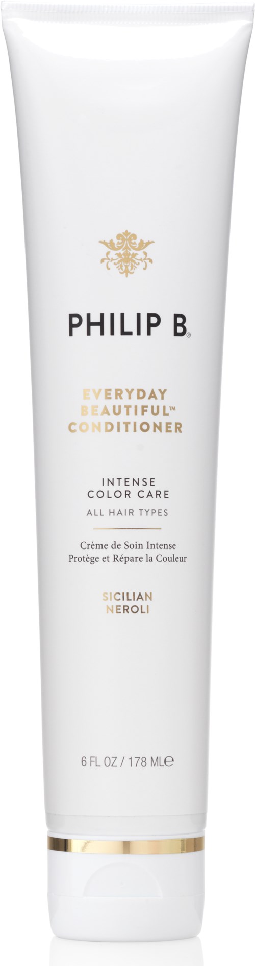 Ein weißer Tube mit Philip B Conditioner, goldener und schwarzer Beschriftung, geeignet für alle Haartypen, mit Kräuterduft.