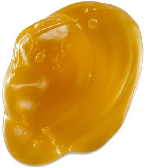 Gele mosterd met een gladde, glanzende oppervlakte en kleine belletjes.