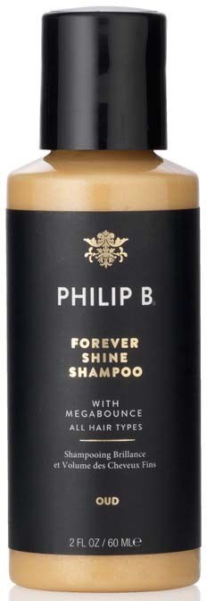 Eine Flasche Philip B Forever Shine Shampoo in Schwarz und Beige für alle Haartypen.