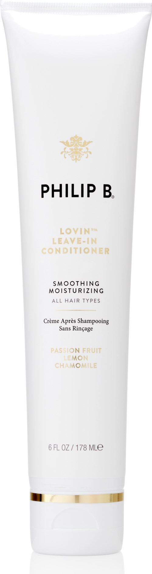 En vit tub med Philip B. Leave-In Conditioner med gula detaljer, text om lindring och fuktgivning, 178 ml storlek.