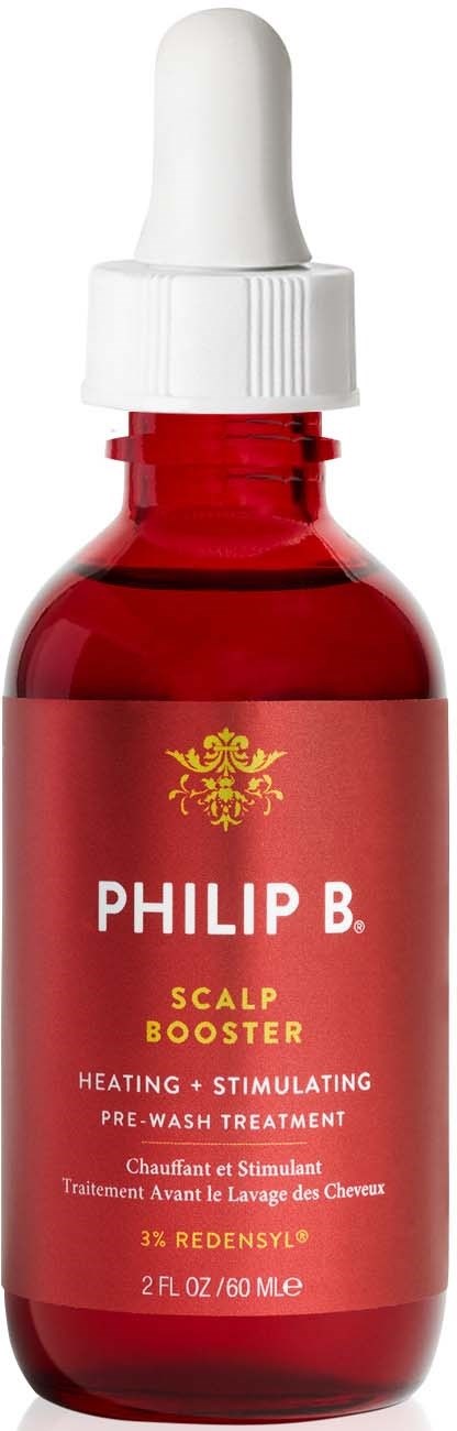 Rote Glasflasche mit weißem Tropfer, beschriftet 'Philip B. Scalp Booster, Heating + Stimulating, Pre-Wash Treatment.'