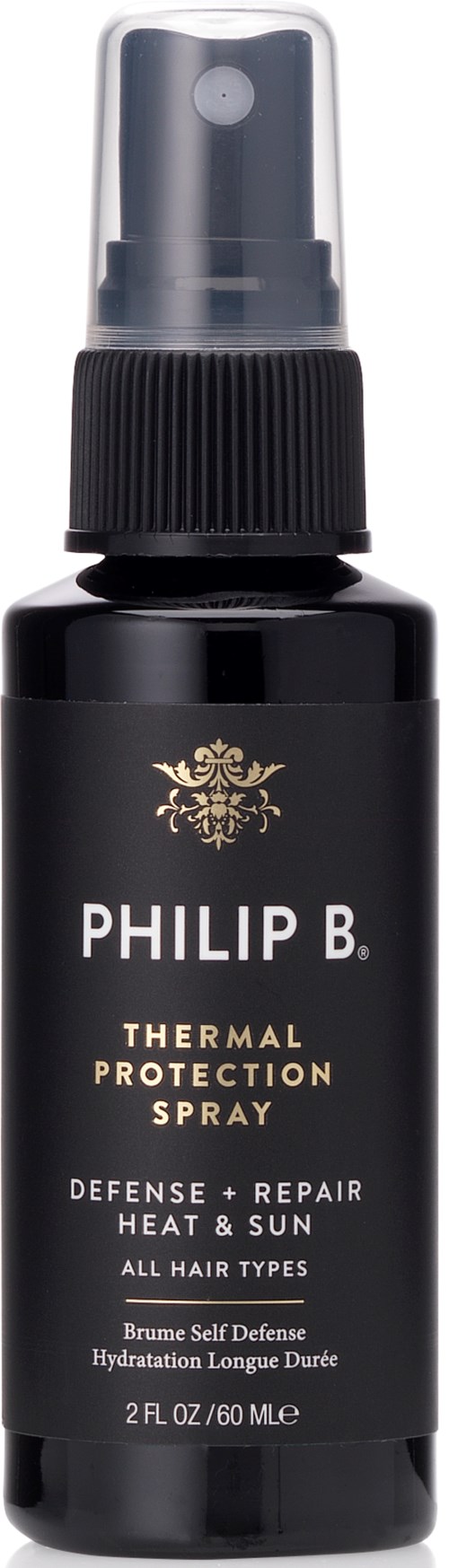 En svart flaska med sprayhuvud för hårskydd och reparation, märkt som Philip B. värmeskyddsspray.