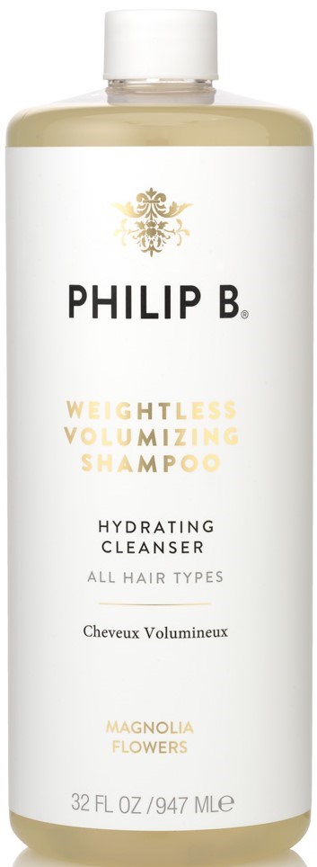 Eine weiße Flasche mit goldfarbenem und schwarzem Text für hydrierenden, gewichtslosen, volumengebenden Shampoo für alle Haartypen.