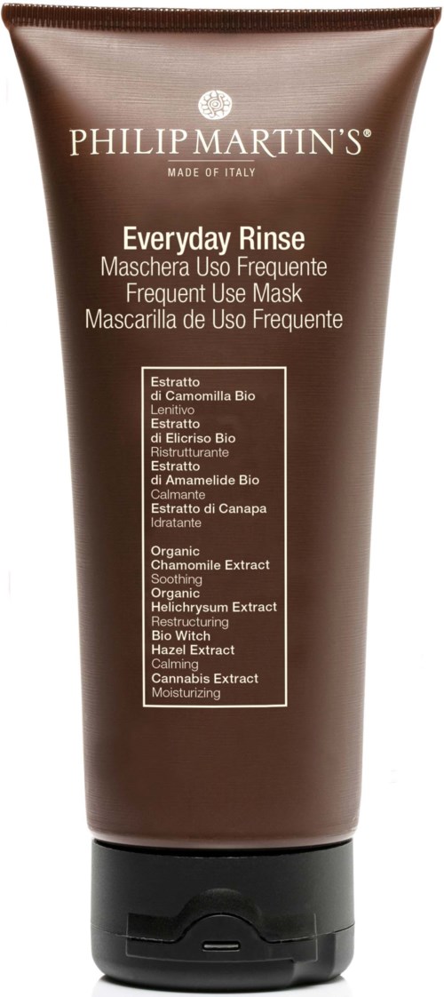 A brown tube labeled 'Philip Martin's' for frequent use mask with natural ingredients and moisturizing properties.