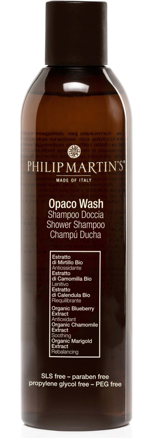 A brown bottle of Philip Martin's Opaco Wash Shampoo with a black cap, containing natural ingredients like blueberry and chamomile.