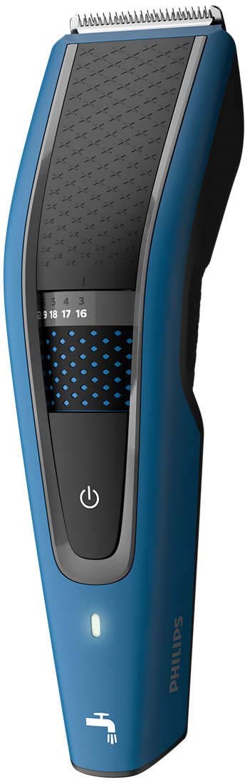 Een blauwe en zwarte elektrische tondeuse met een aan/uit-knop, display en lichtindicator.