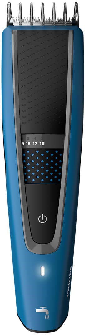 Een blauwe haartrimmer met zwarte grip, verstelbare lengte-instellingen en een aan/uit-knop, inclusief een kleine LED-lamp.