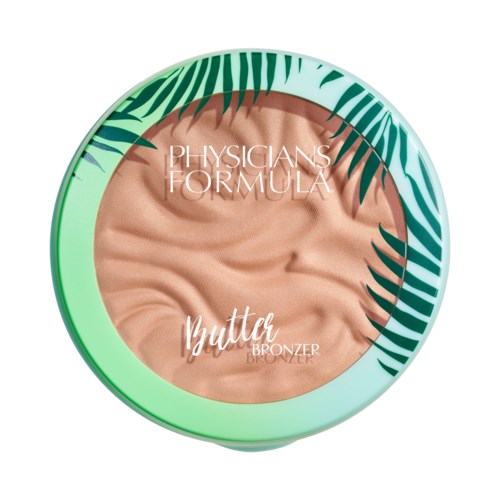 Ronde bronzer met naam, omgeven door groene palmbladeren.