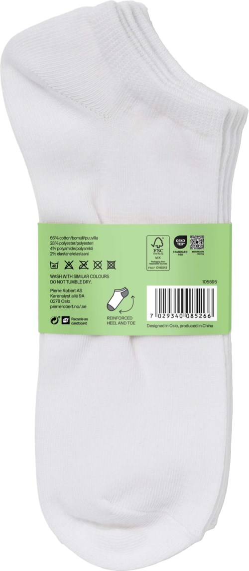 A pair of white ankle socks with a green label wrapped around them.