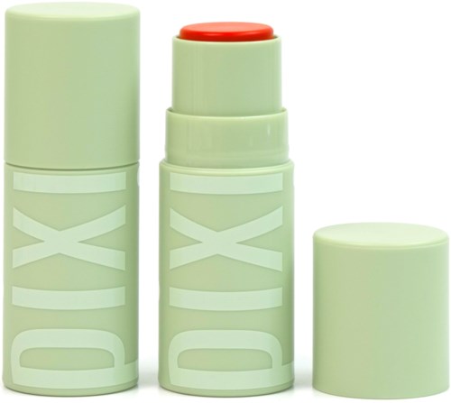 Drie groene deo-sticks met DX, een open met oranje deksel.