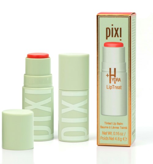 Een lippenbalsemproduct van het merk Pixi in een witte verpakking met oranje details en een rood deksel.