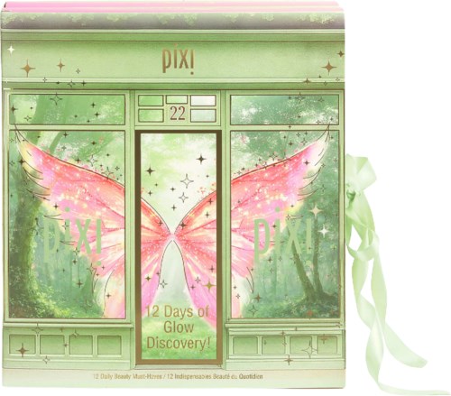 Grön boxförpackning med rosa feänglar och gulddetaljer, band på sidorna och texten 12 days of glow discovery.