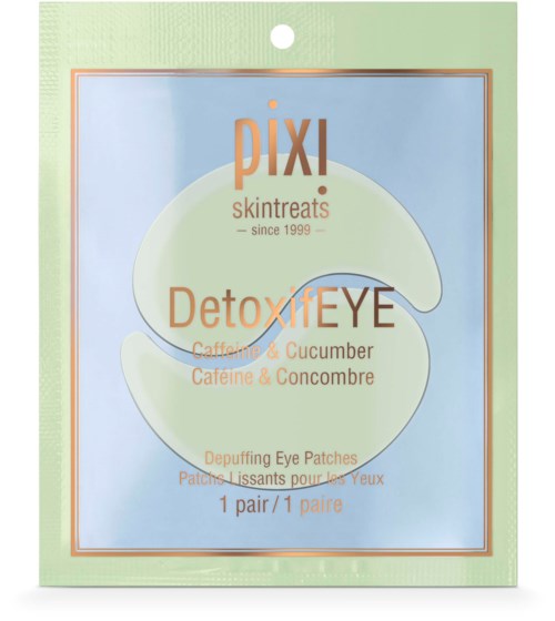 A package of eye patches with caffeine and cucumber, labeled for detoxifying and reducing puffiness around the eyes.