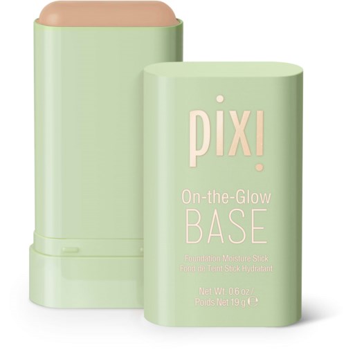 Vihreä mintunvärinen tiku, jossa beige kansi ja merkintä "PIX! On-the-Glow BASE," sisältäen meikkipohjan.