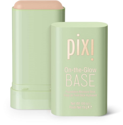 Vihreä harmaa pohjustusvoideputeli, jossa vaaleanpunainen korkki, teksti "Pixi On-the-Glow Base" pehmeän vaaleanpunaisilla ja valkoisilla kirjaimilla.