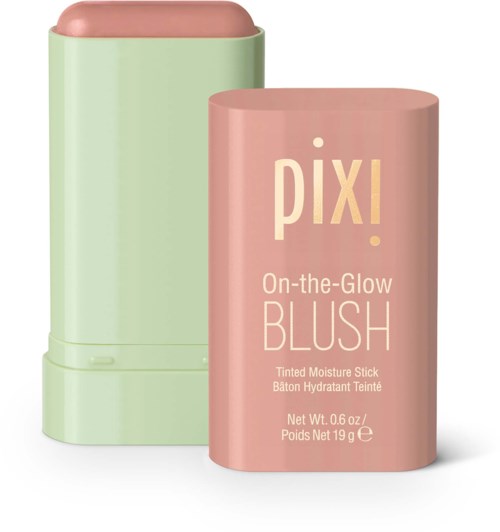 Pink and green containers with a blush stick and the Pixi logo visible. The blush stick is slightly exposed.