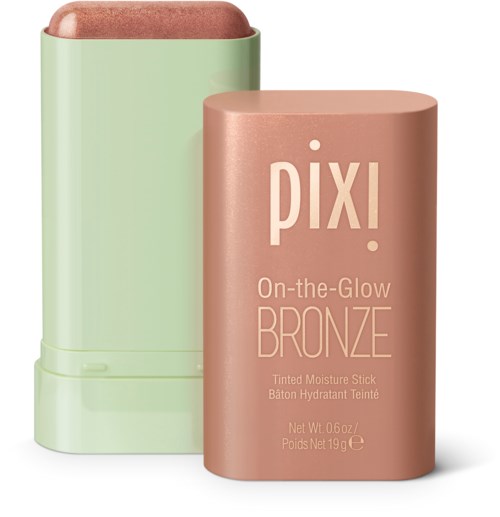 Ein rosa Make-up-Stick mit der Aufschrift 'Pixi On-the-Glow Bronze' neben einem grünen Verschluss.