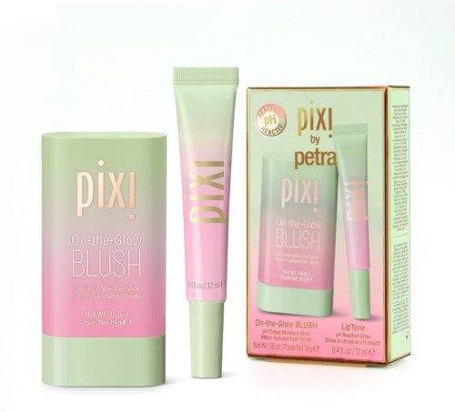 Three skincare products in pastel pink and green, including a jar, tube, and a box with product details.