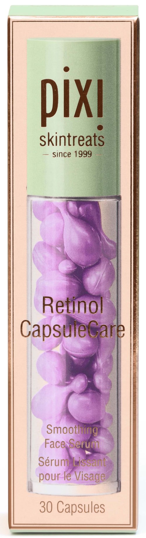 Pakkauksessa on pinkkejä kapseleita, merkitty 'Retinol Capsule Care' kasvojenhoitoon. Tuotemerkki on Pixi, perustettu 1999.